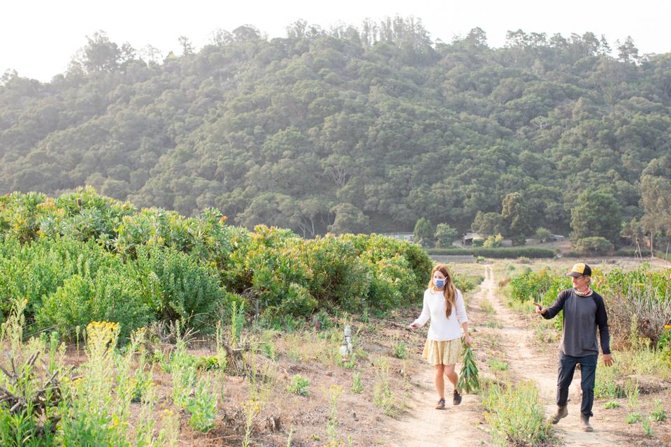 Emily and Louie on his flower farm in California