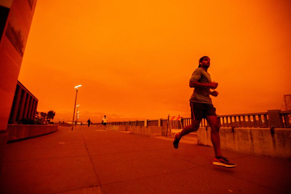 Red-Orange Skies from the Northern California Wildfires Blanket San Francisco Bay Area