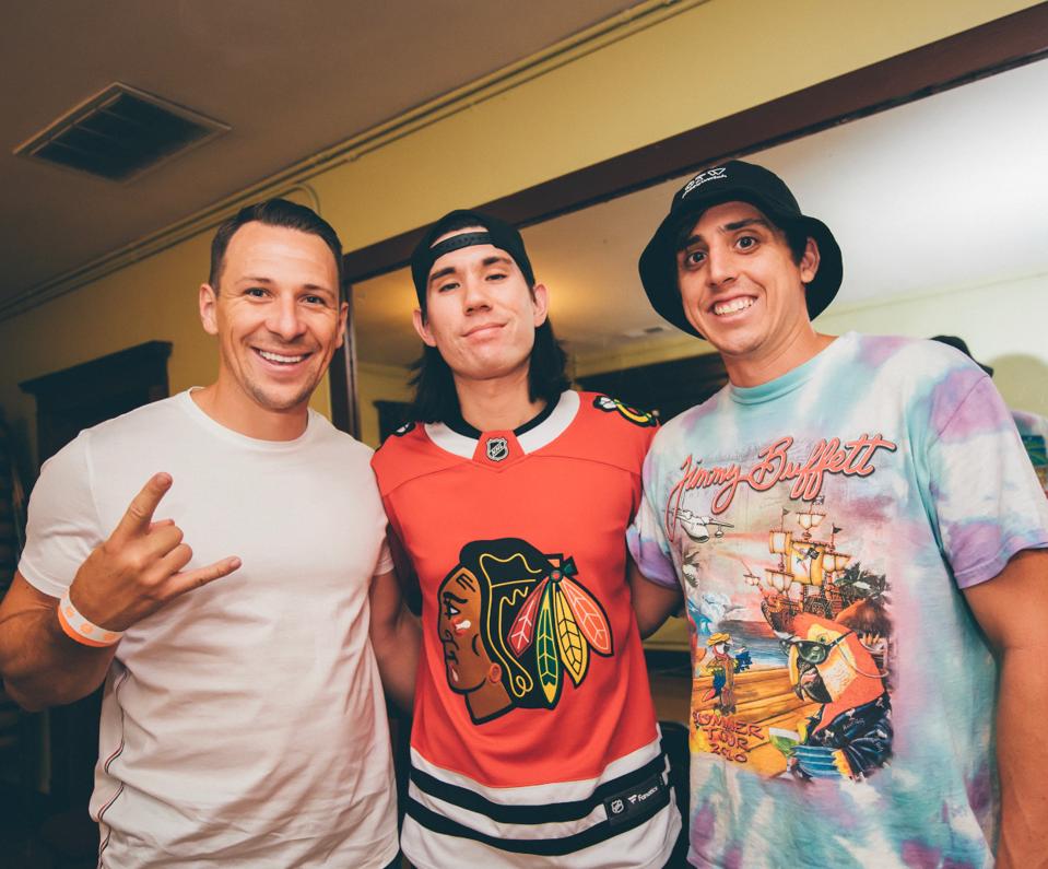Nick Groff with Gryffin and Austin Evenson at Lollapalooza in 2019.