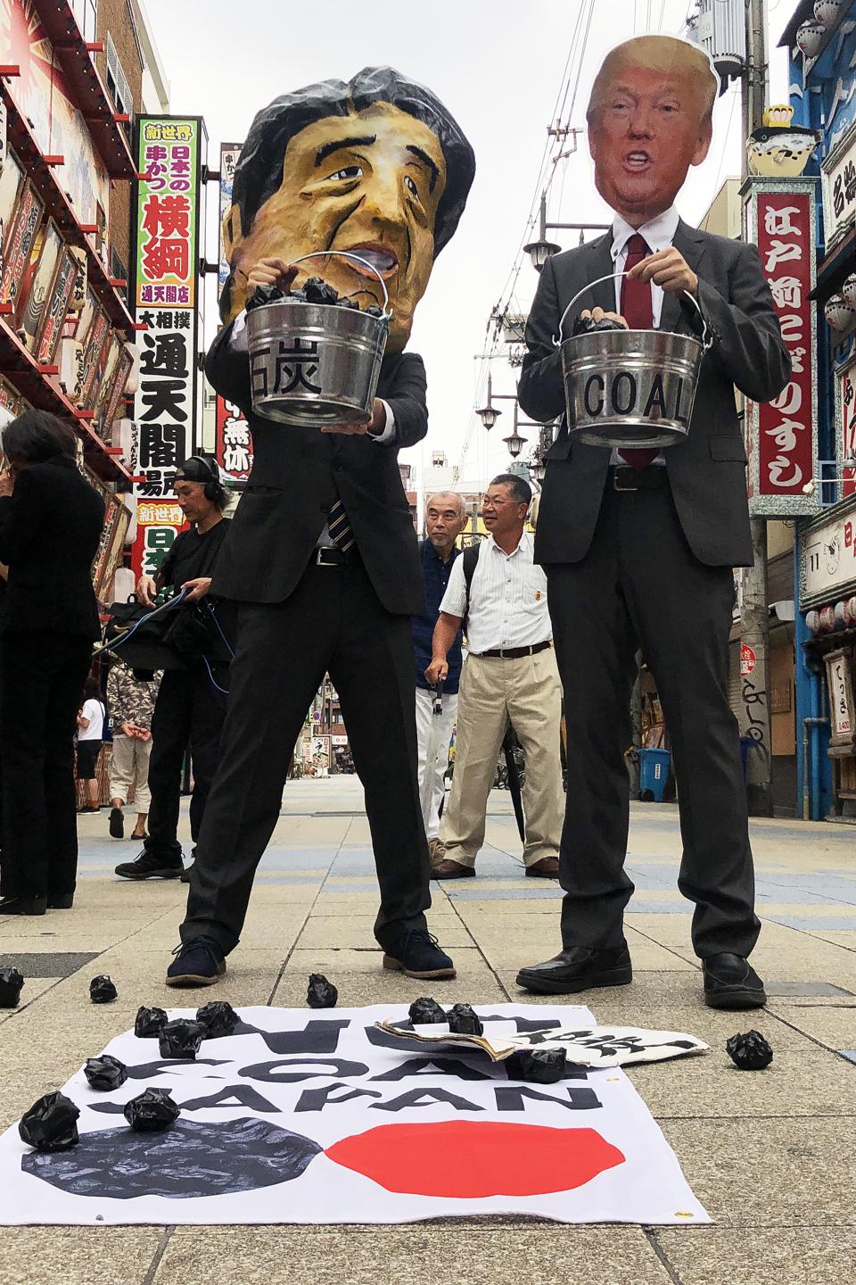 28 Jun 2019: Climate activists at the G20 protesting against Japan's and the U.S. support for coal under Prime Minister Abe and President Trump