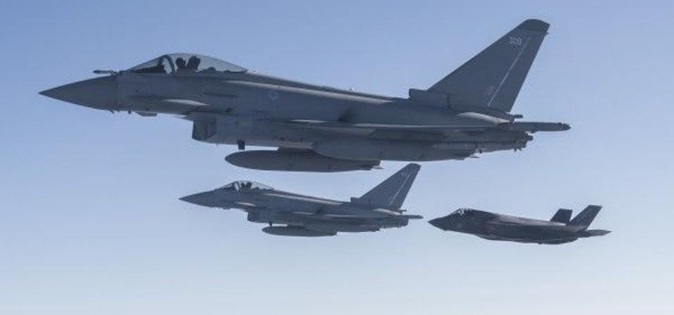 A pair of RAF Eurofighter Typhoons in formation with the F-35 by 2020.
