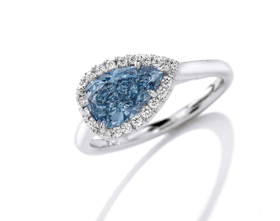 A ring set with a 1.08-carat pear-shaped fancy vivid blue diamond sold for $927,500