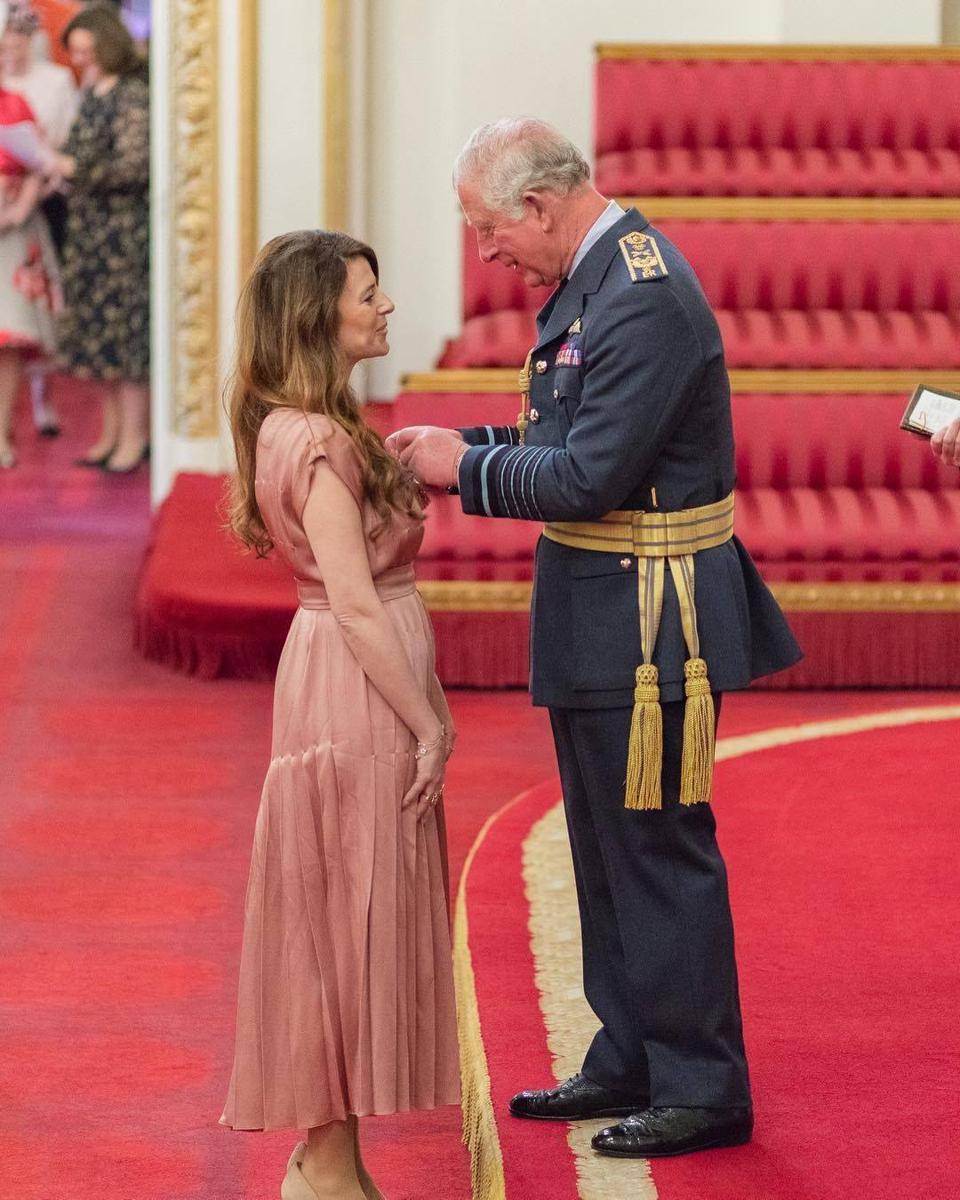 Lea Baroudi receiveng honorary membership into the Order of the British Empire