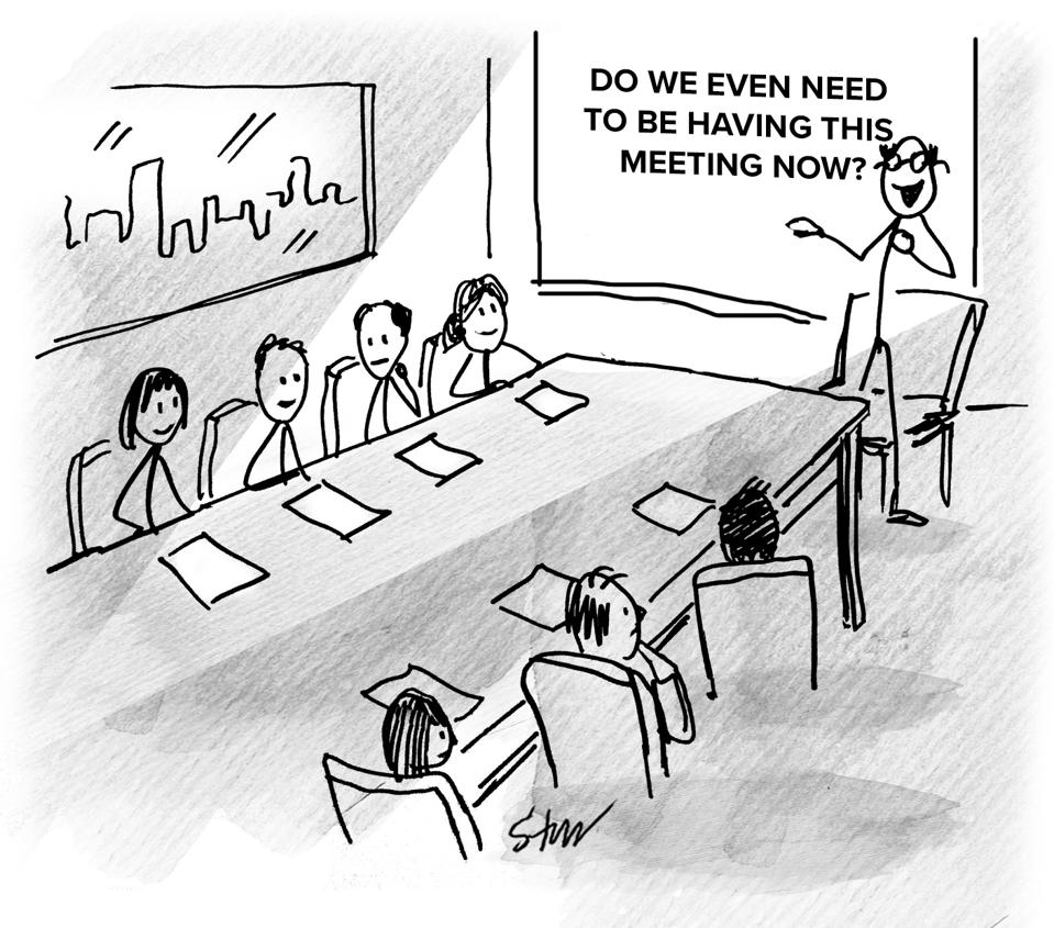 Board room meeting with a presentation slide reading: ″DO WE EVEN NEED TO BE HAVING THIS MEETING NOW?″