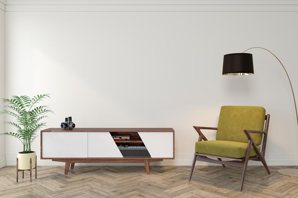 Mid century modern interior empty room with white wall, dresser, console, yellow lounge chair, armchair, floor lamp, wood floor. 3d render illustration mockup.
