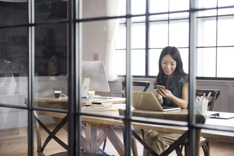 Asian businesswoman using smartphone