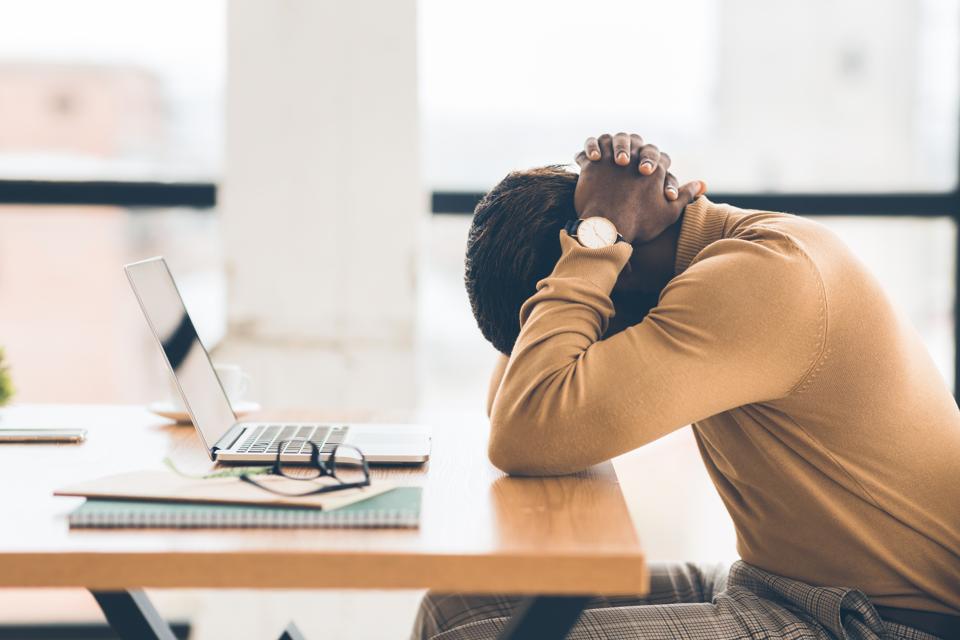 exhausted employee burnout while working from home