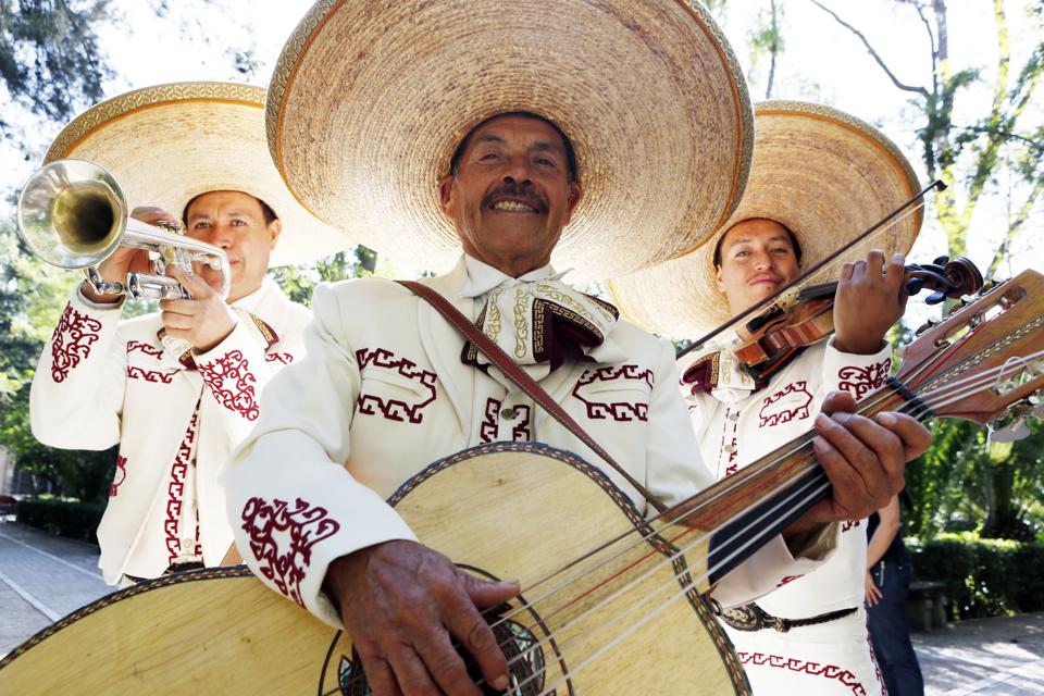 Musicians playing in mariachi band, Mexico.