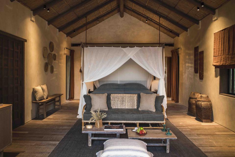 The hotel rooms at Bai San Ho in Vietnam have traditional and stylish decoration