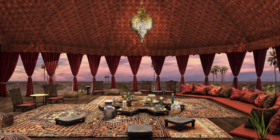 There are cushions and low tables in the safari lodge tea tent at Jack's Camp in Botswana