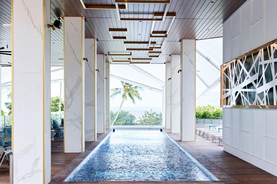 The hotel pool at the Flynn in Cairns, Australia, is within a contemporary enclosure.