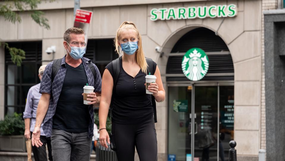 Starbucks customers in September 2020 in NYC's Union Square dealing with COVID-19 restrictions