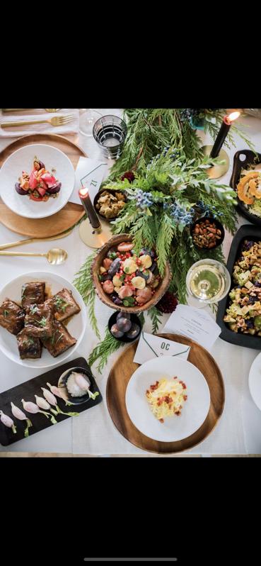 a beautiful table scape from destination Home with multiple course meal for at home events