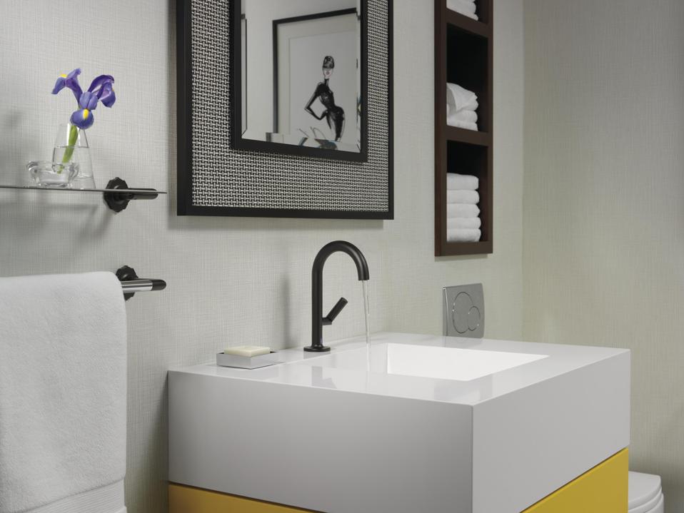 Bathroom with hands-free faucet.