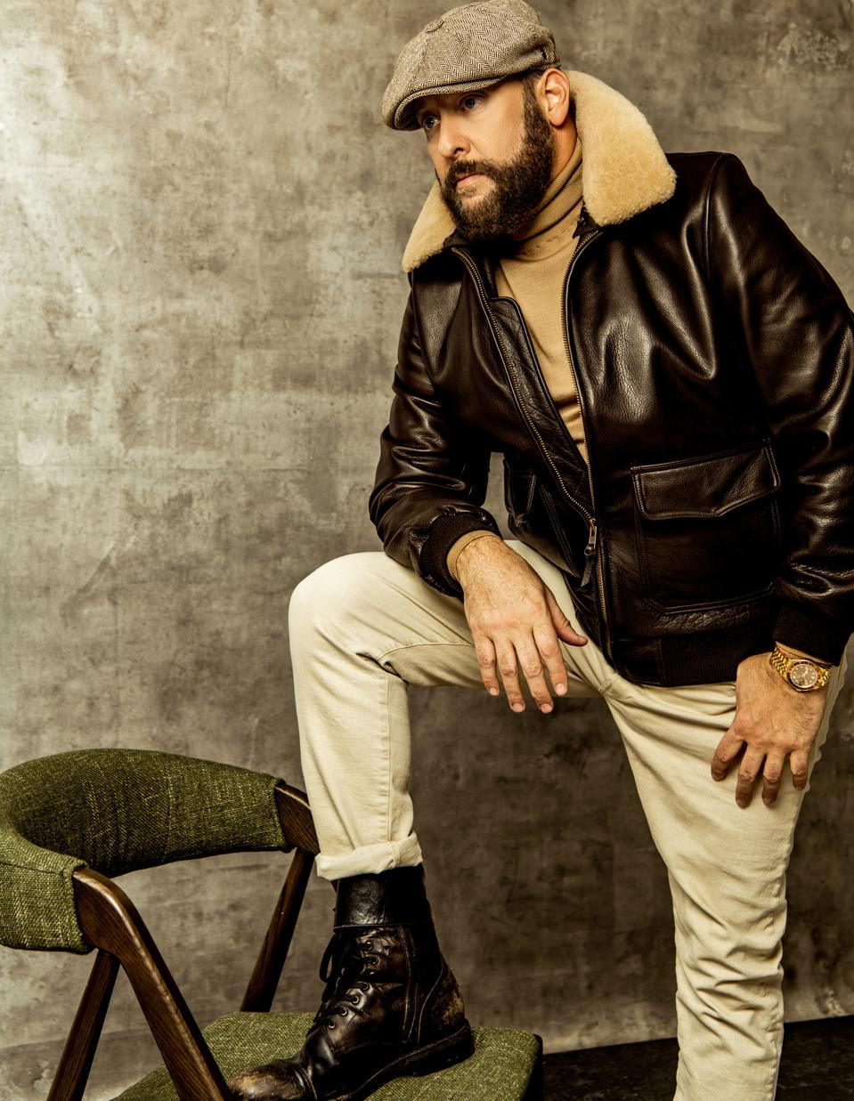 Brad Feinstein - CEO, Romulus Entertainment wears Leather bomber Jacket | Golden Bear. Jeans Ralph Lauren boots Frye watch Rolex