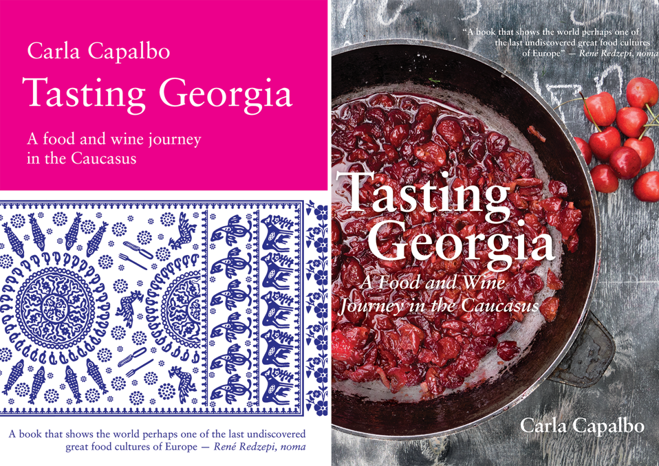 Book jacket with Tasting Georgia title atop bowl of cherries