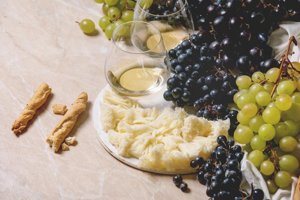 Swiss cheese tete de moine on ceramic board