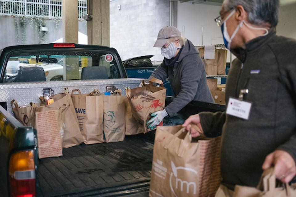 Home delivery requests have increased at the University District Food Bank in Seattle.