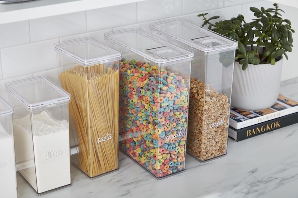 container store clear bins on a coutnertop
