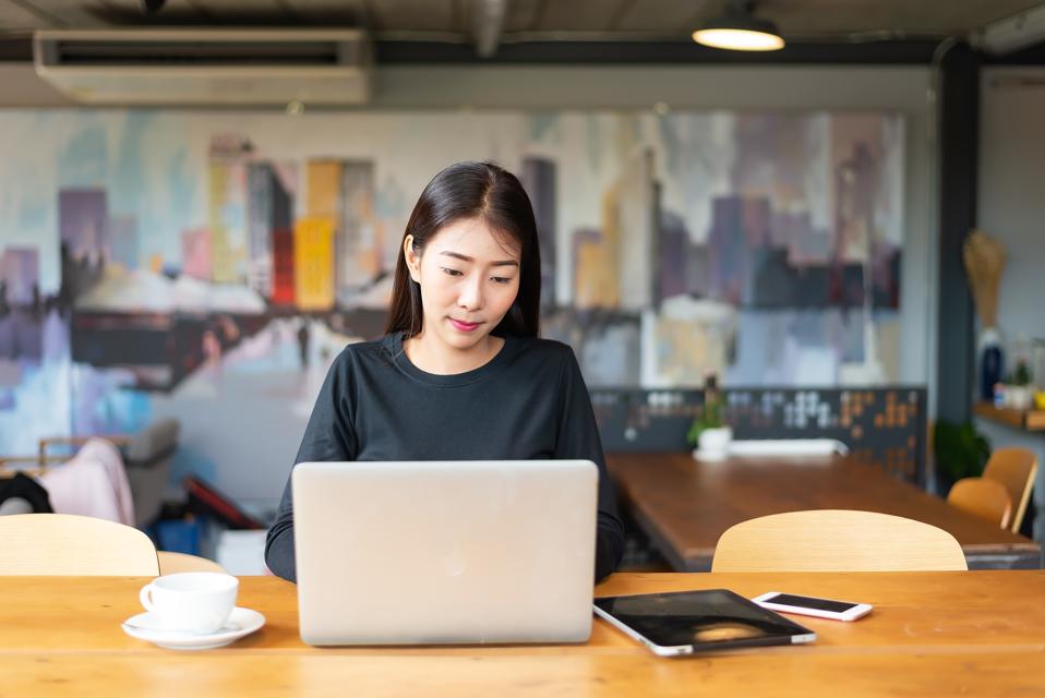 Young business woman working online shopping at her home. Lifestyle for working at home. business online.