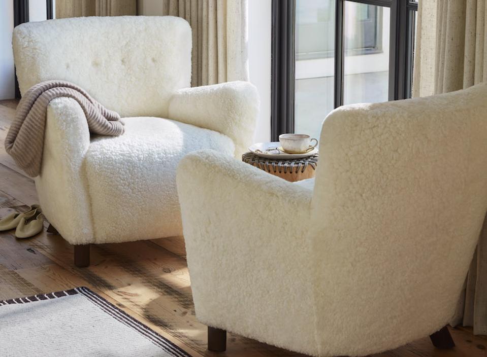 White boucle chairs facing each other in a living room
