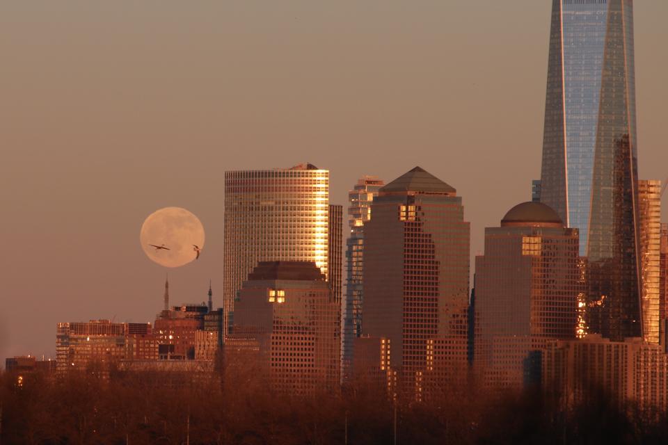 In Photos: The 'Cold Christmas Moon' Sparkles In Winter Skies Around The World