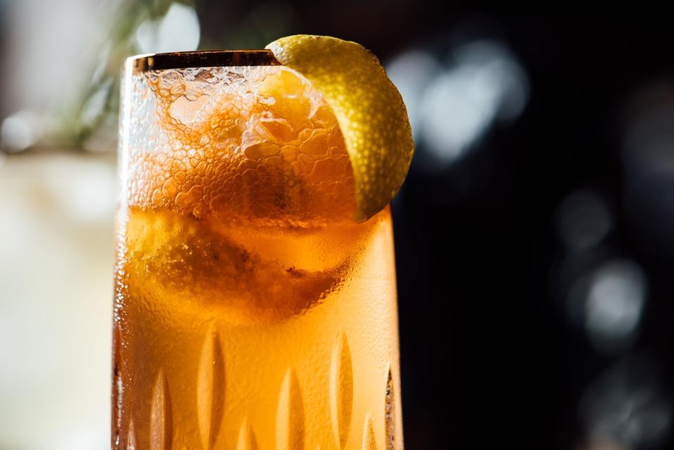 Peach infused champagne cocktail.