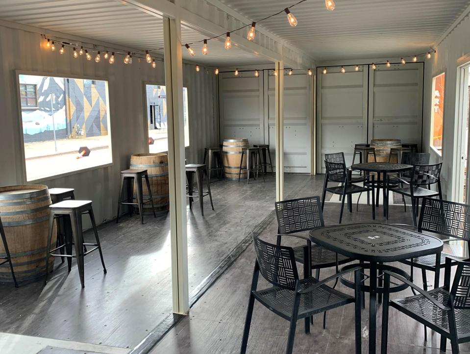 Chairs and tables in a shipping container