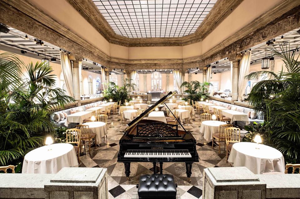 The elegant Palmehaven restaurant at the Britannia Hotel in Trondheim, Norway has a piano