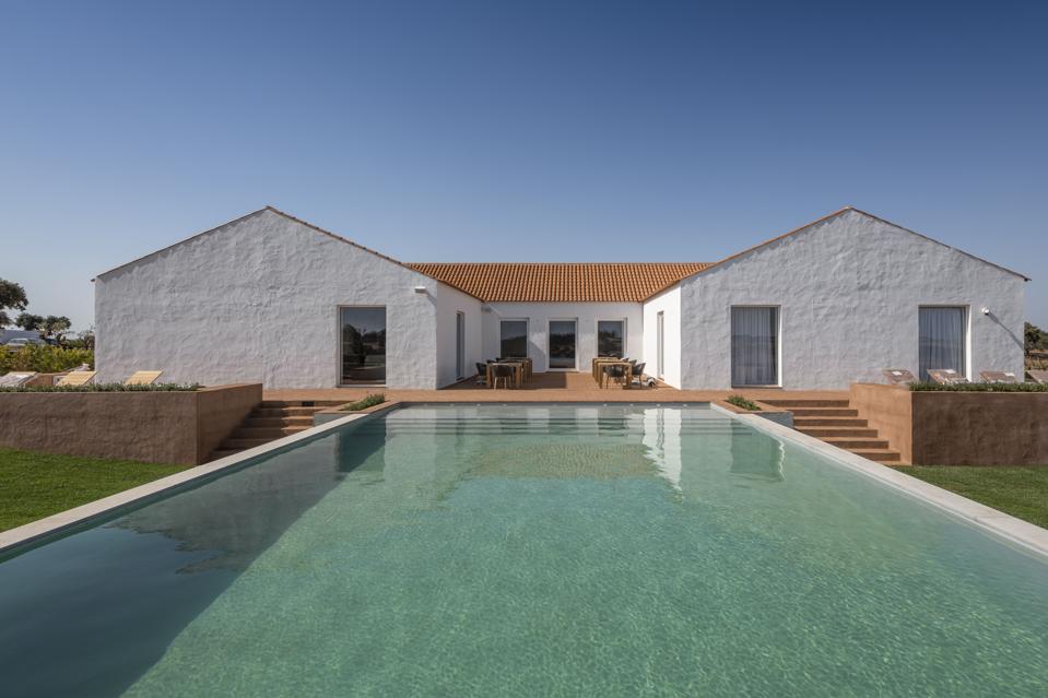 The pool in front of the villa at Herdade da Malhadinha Nova in Portugal is inviting.