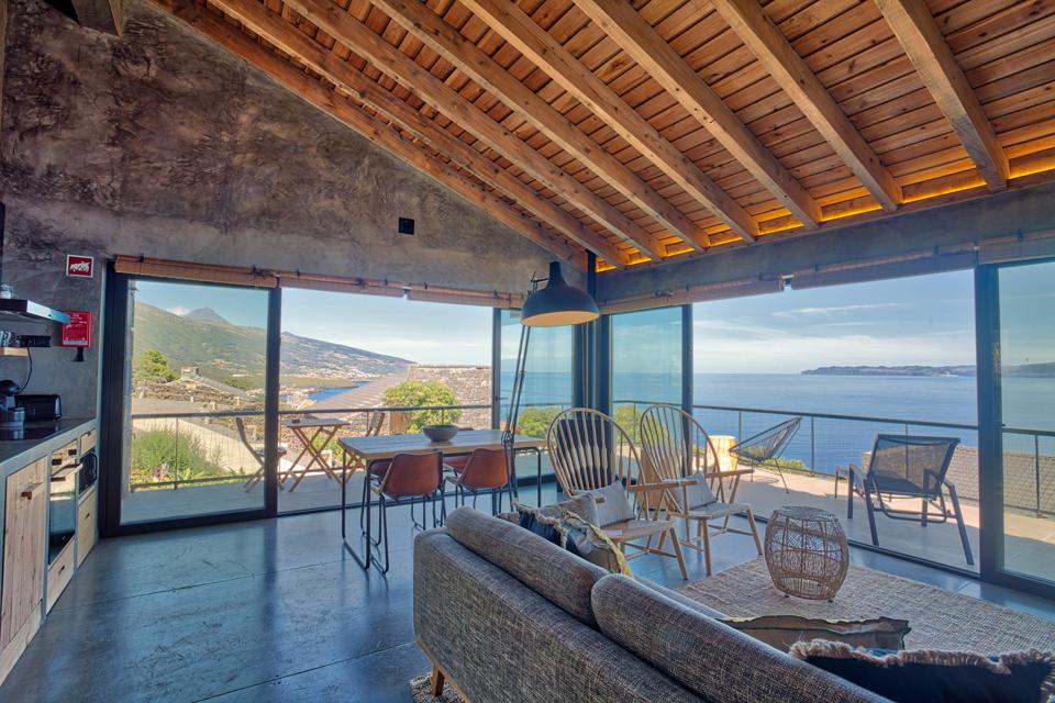 The houses at Lava Homes on Pico Island in the Azores, Portugal, have ocean views
