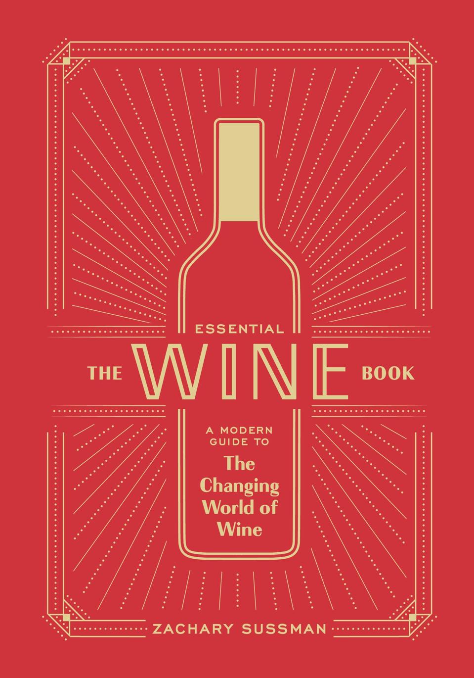 Red cover of book with gold wine bottle reads The Essential Wine Book