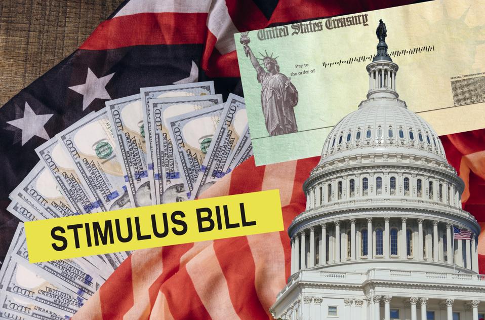 Senate stimulus deal includes individual checks virus economic stimulus plan US 100 dollar bills currency on American flag Global pandemic Covid 19 lockdown