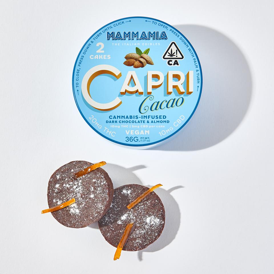 Two chocolate cannabis edibles depicted with their stylized tin.