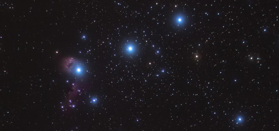 Between Alnilam and Mintaka (farthest to the right) you’ll see a line of stars snaking between them in an “S” shape.