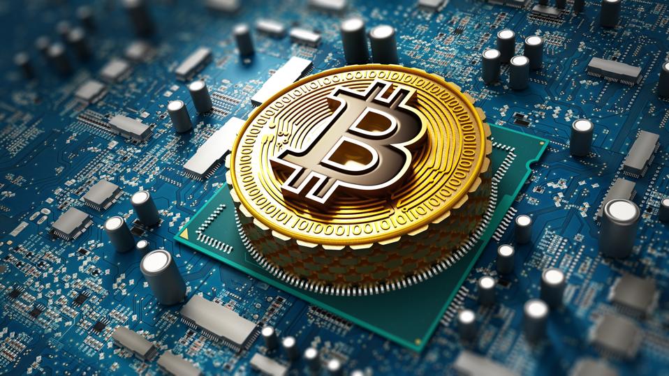 A picture of bitcoin, a digital currency, on a motherboard.