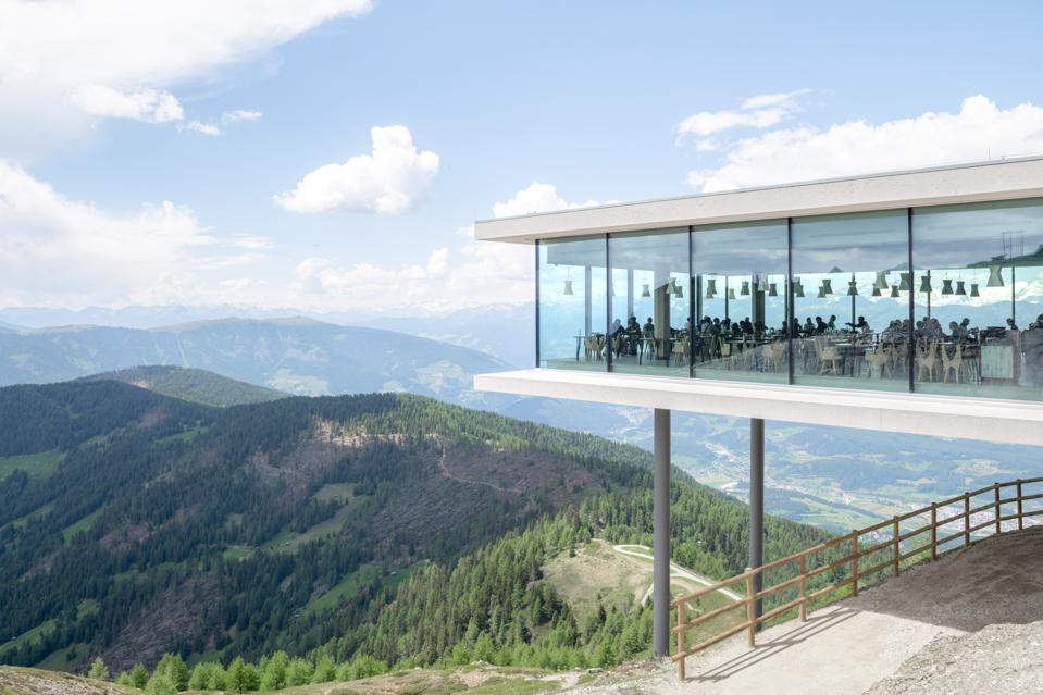 AlpINN restaurant hangs over the edge of a mountain in the Dolomites region of Italy