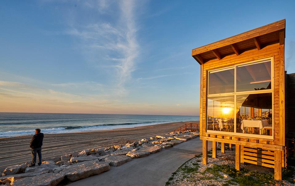 Bar do Fundo restaurant near Lisbon Portugal has a great location right on the beach