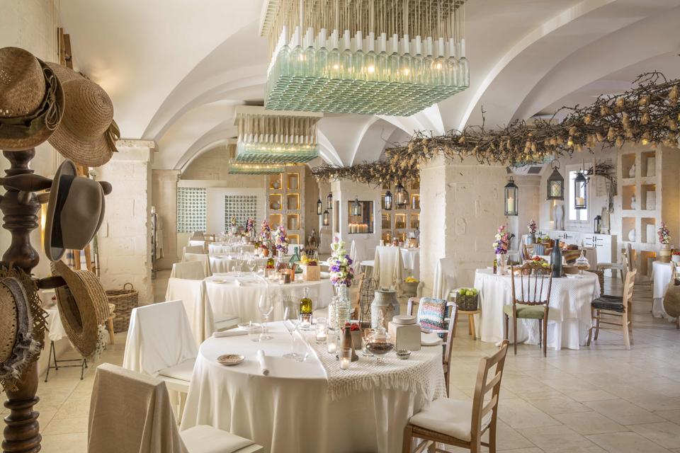 The dining room at Due Cimini restaurant at Borgo Egnazia in Italy has rustic elements
