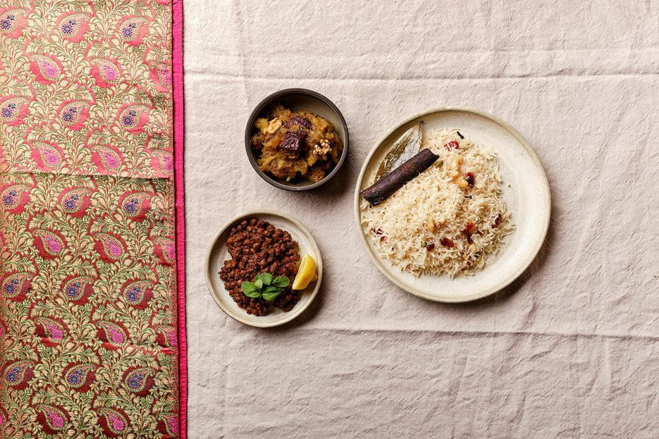 three Indian dishes on cloth