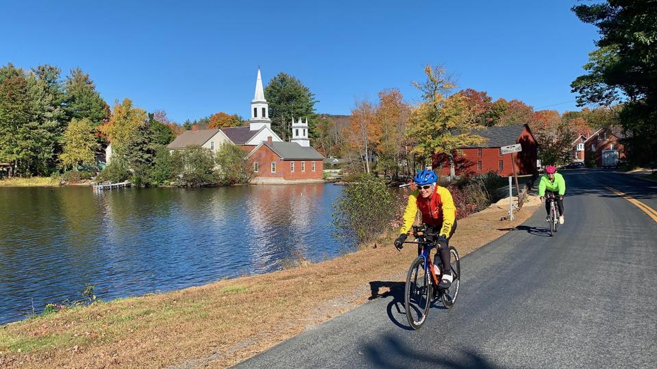 Cycling past a pond in Harrisville, New Hampshire