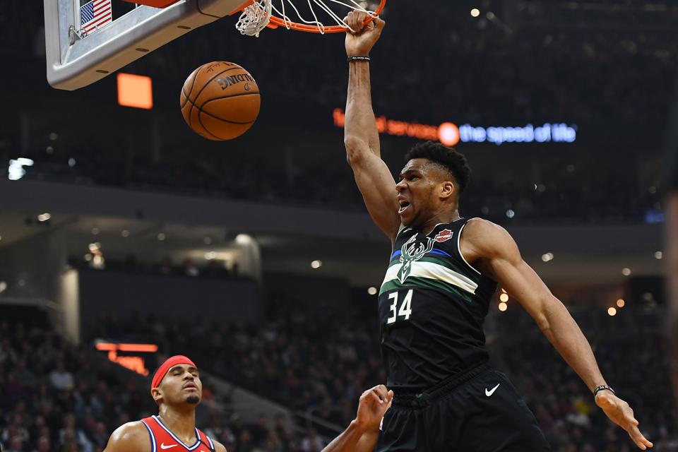 Giannis Antetokounmpo dunks against the Philadelphia 76ers during the first half of a game at Fiserv Forum on February 06, 2020 in Milwaukee, Wisconsin.