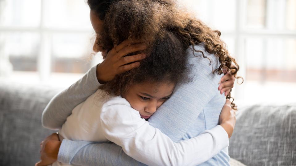 Mother and daughter embracing