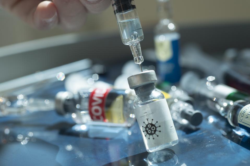 Covid-19 (coronavirus) and vaccine vial.