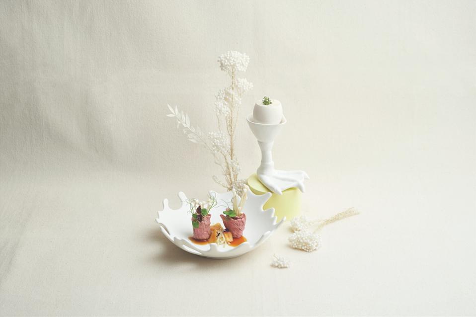 A dish of poached wagyu beef with onsen tamago at Peach Blossoms - Parkroyal Collection Marina Bay.