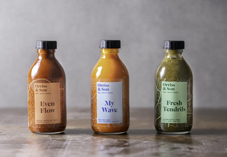 three bottles of chilli sauce
