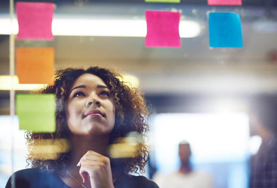Woman brainstorming business idea