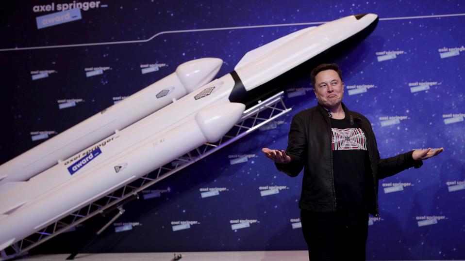 SpaceX owner and Tesla CEO Elon Musk arrives on the red carpet for the Axel Springer media award, in Berlin, Germany, Tuesday, Dec. 1, 2020.