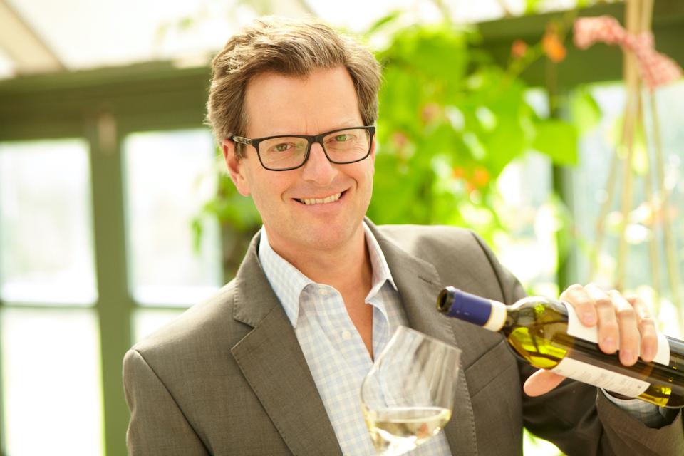 wine critic with wine and glass