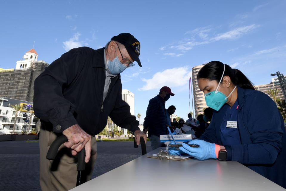 Long Beach opens mass vaccine site at convention center.